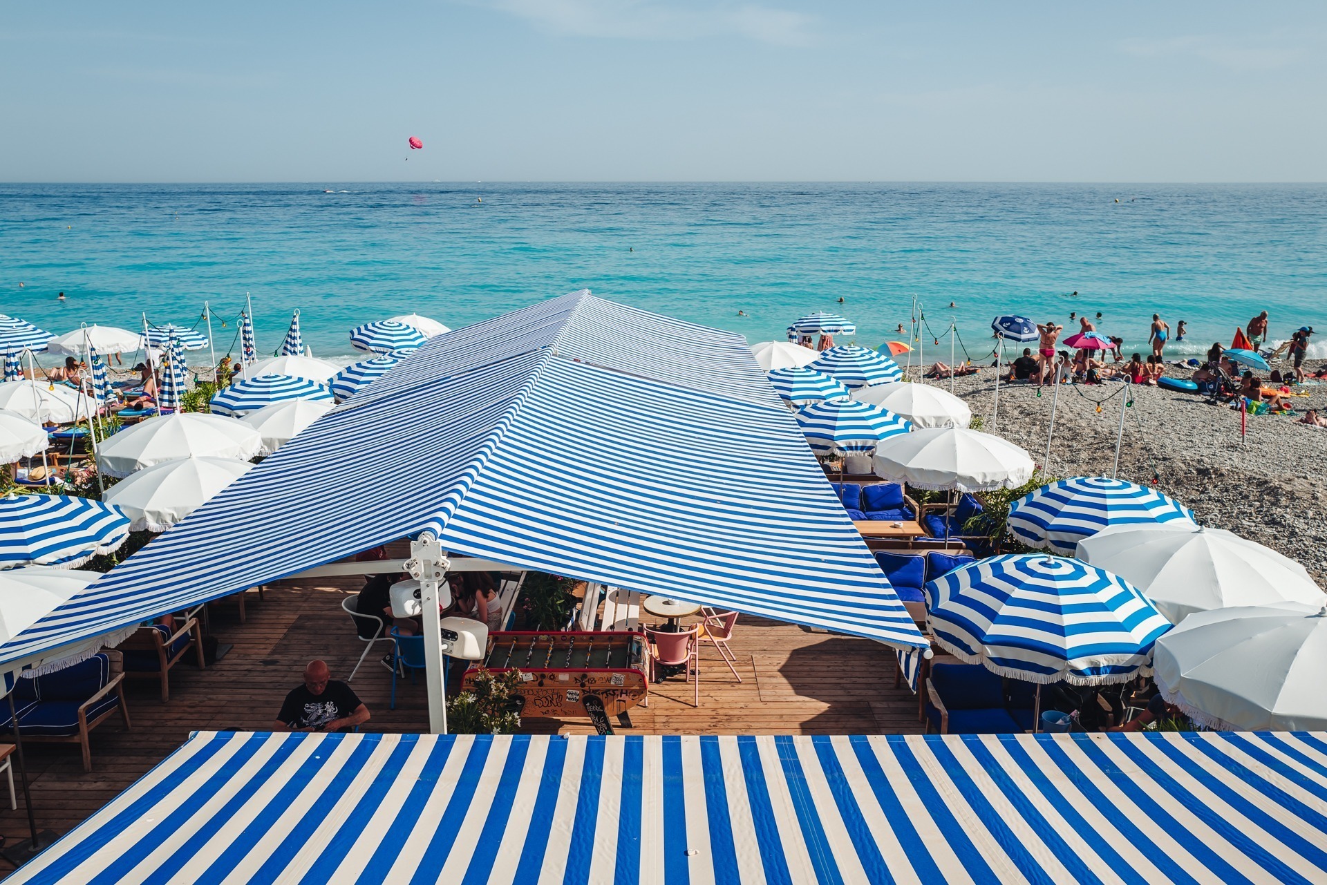 Nice, France-June 2022: life by The beautiful stone beach